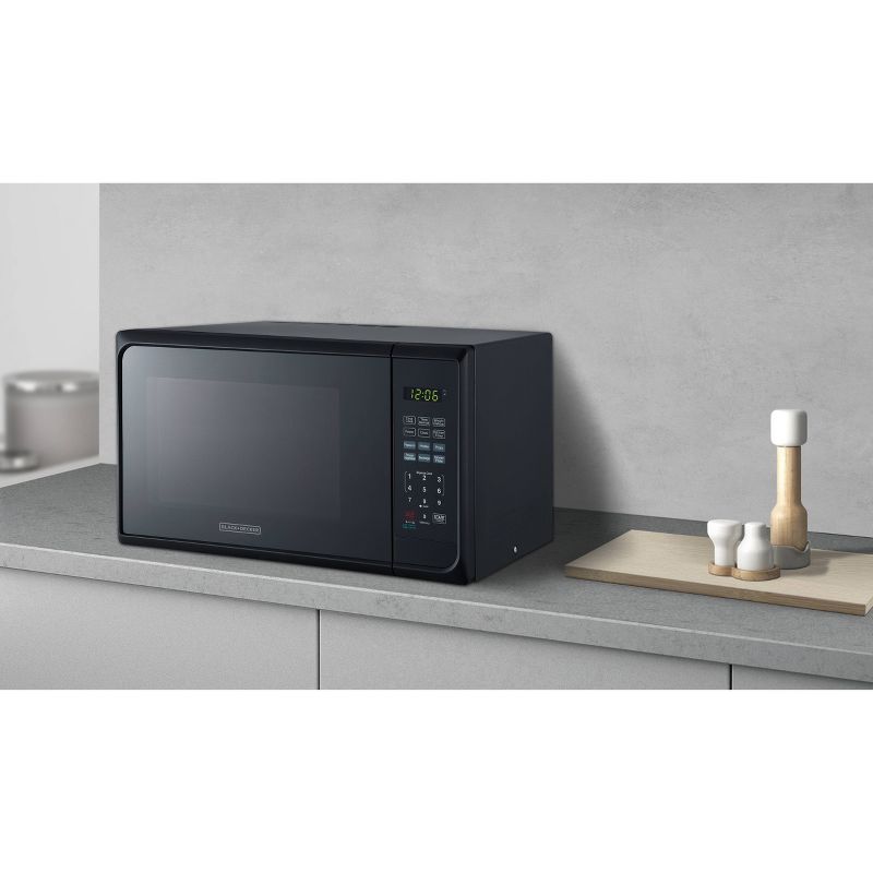BLACK+DECKER 1.1 cu ft 1000W Microwave Oven - Stainless Steel Black