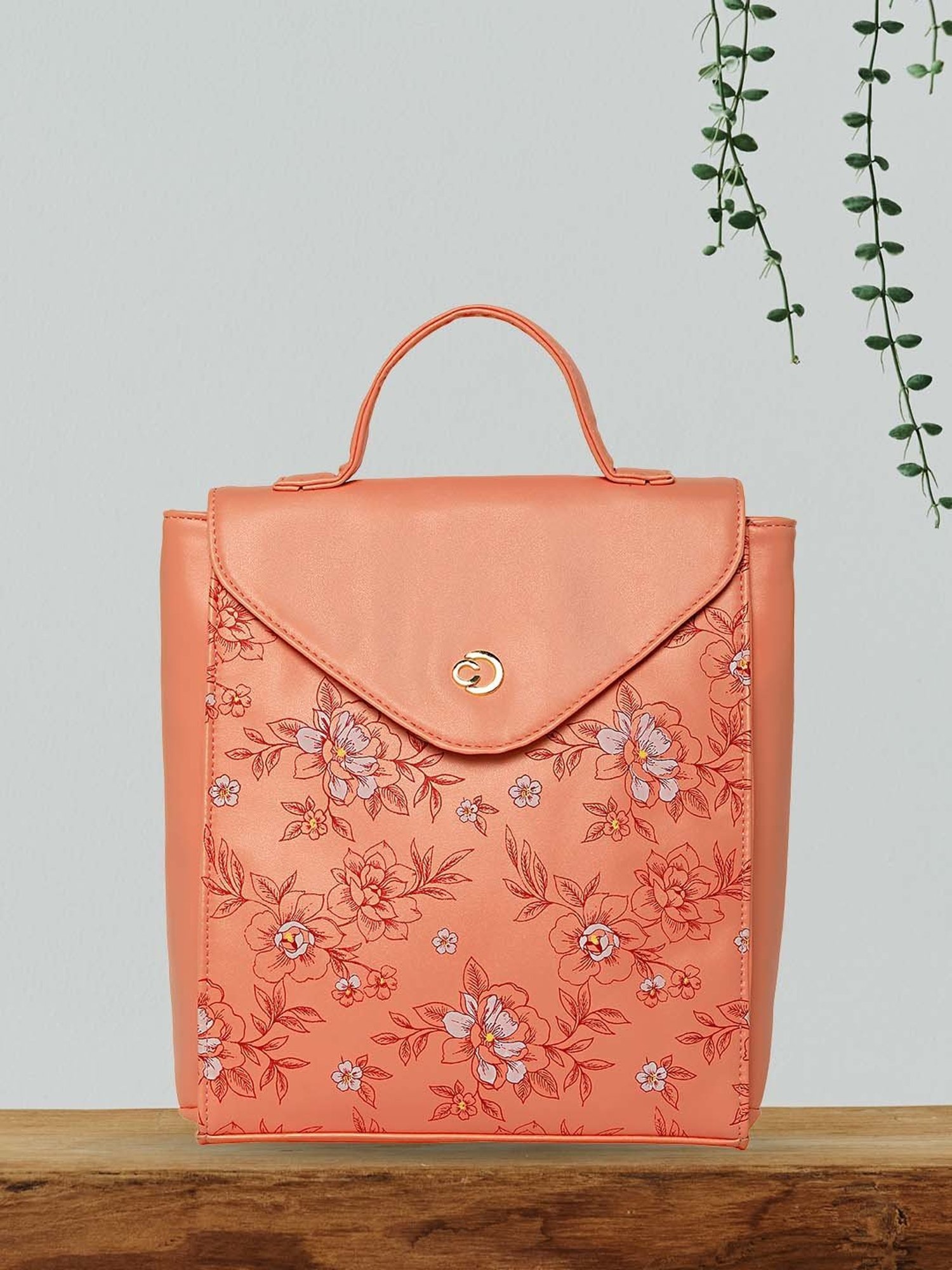 Caprese SNOW Orange Faux Leather Medium Backpack