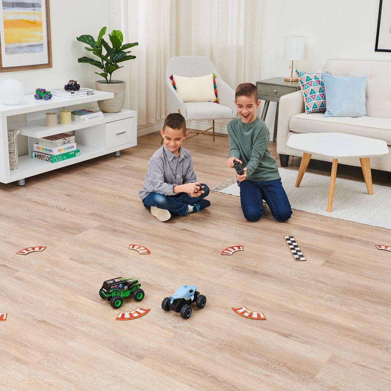 Monster Jam Official Grave Digger vs Megalodon Racing Rivals Remote Control Monster Trucks - 1:24 scale - 2 pk