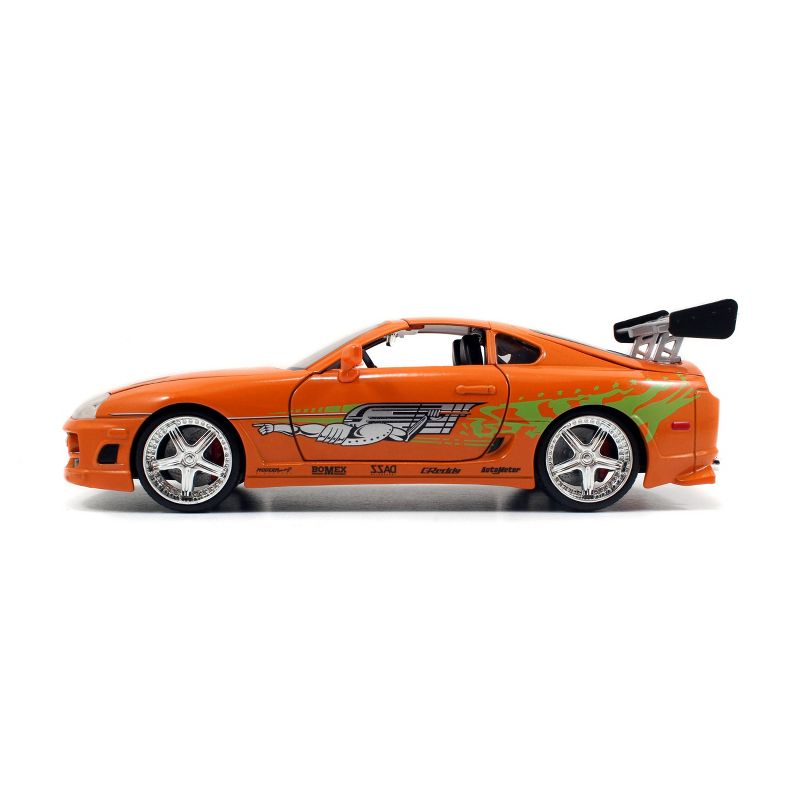 Jada Toys Hollywood Rides Fast & Furious 1995 Toyota Supra Die-Cast Vehicle with Brian Die-Cast Figure 1:24 Scale Metallic Orange