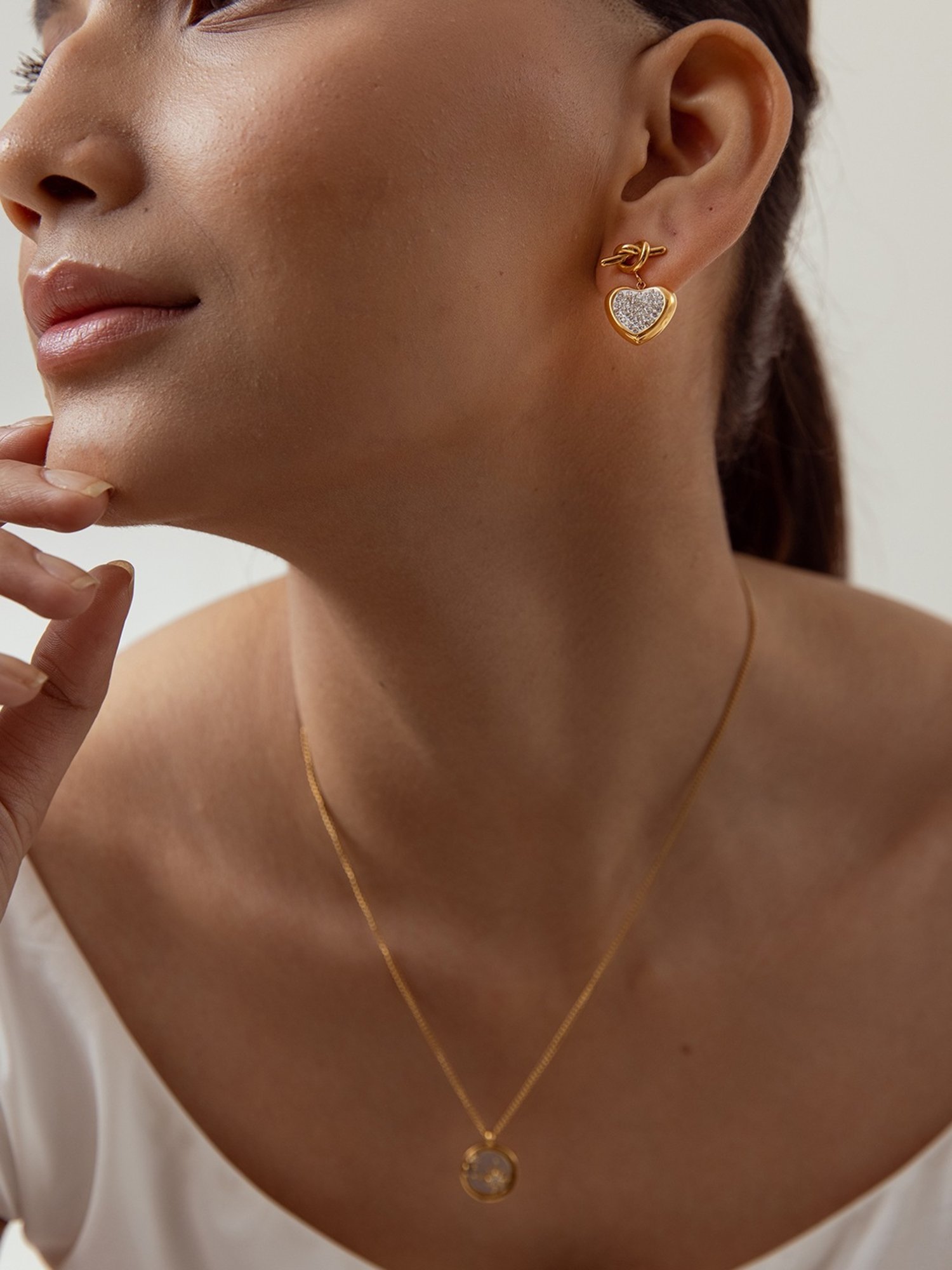 Perfectly Average Knot Heart Charm Earrings Gold