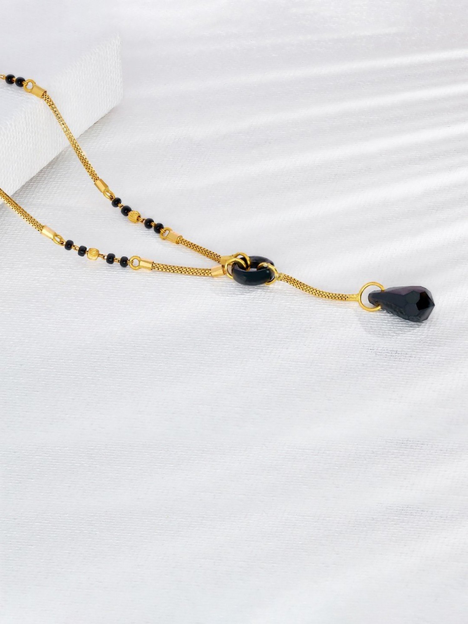 P.N.Gadgil Jewellers 22k Octagonal Pyramid Gold Mangalutra