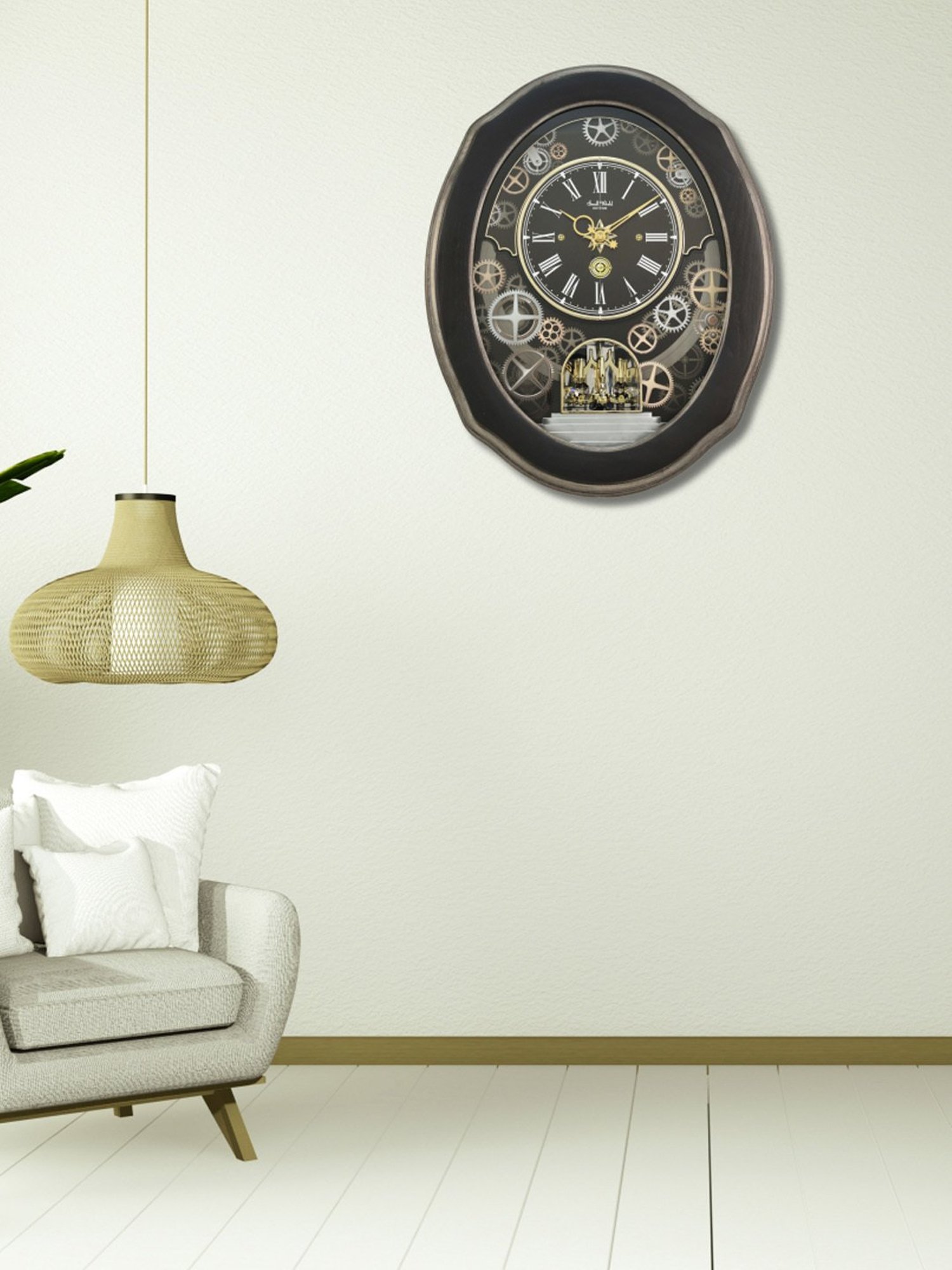 RHYTHM Black Plastic Elegant Oval Shaped Melodies In Motion Wall Clock