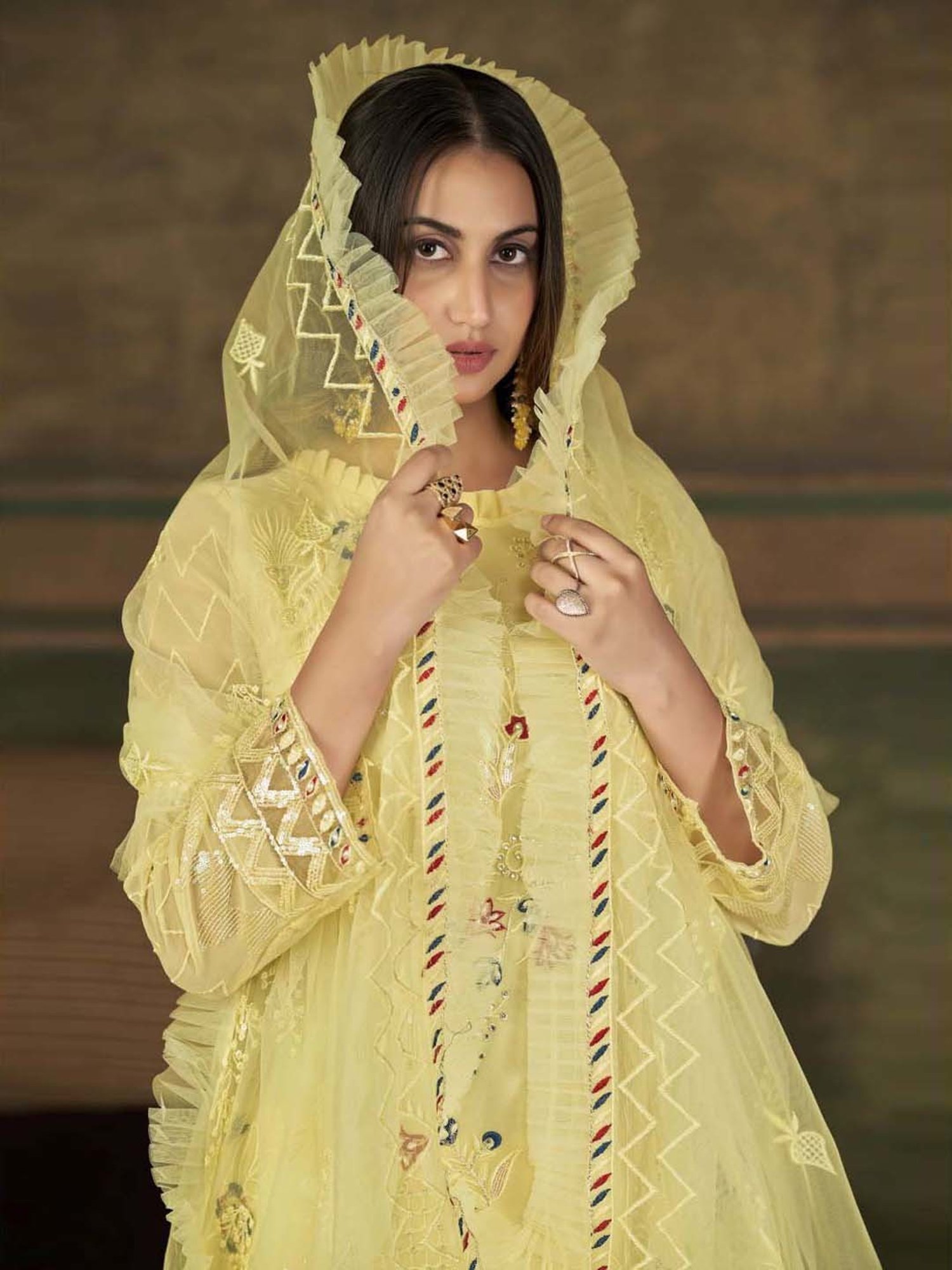 Warthy Ent Yellow Embroidered Semi Stitched Dress Material