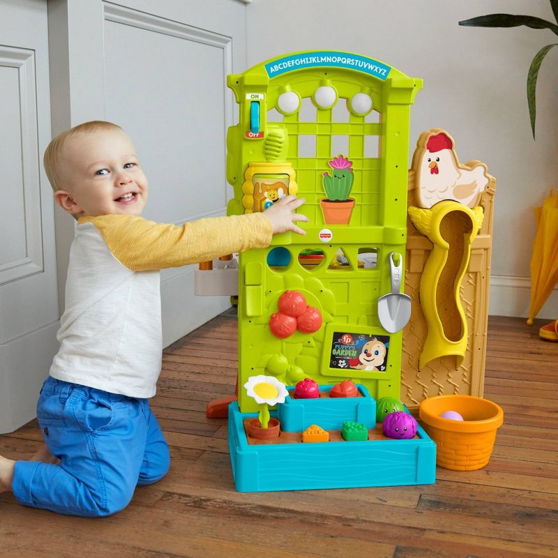 Fisher-Price Laugh & Learn Grow-the-Fun Garden to Kitchen