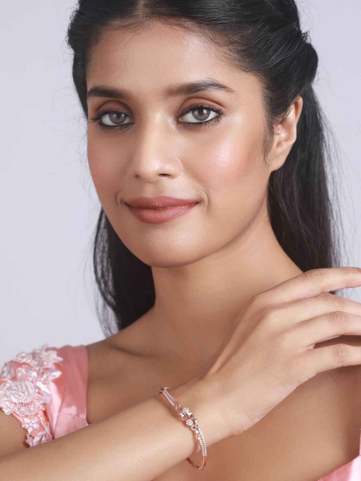 Aatmana Rose Gold-Plated American Diamond Studded Round Shaped Elegant & Sleek Bracelet