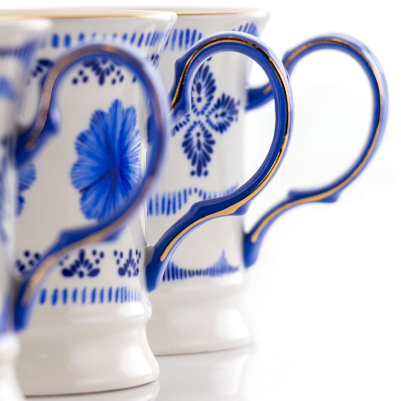 Meritage Navy 12 Piece 13.2 Ounce Fine Ceramic Cup Set in White with 4 Assorted Designs