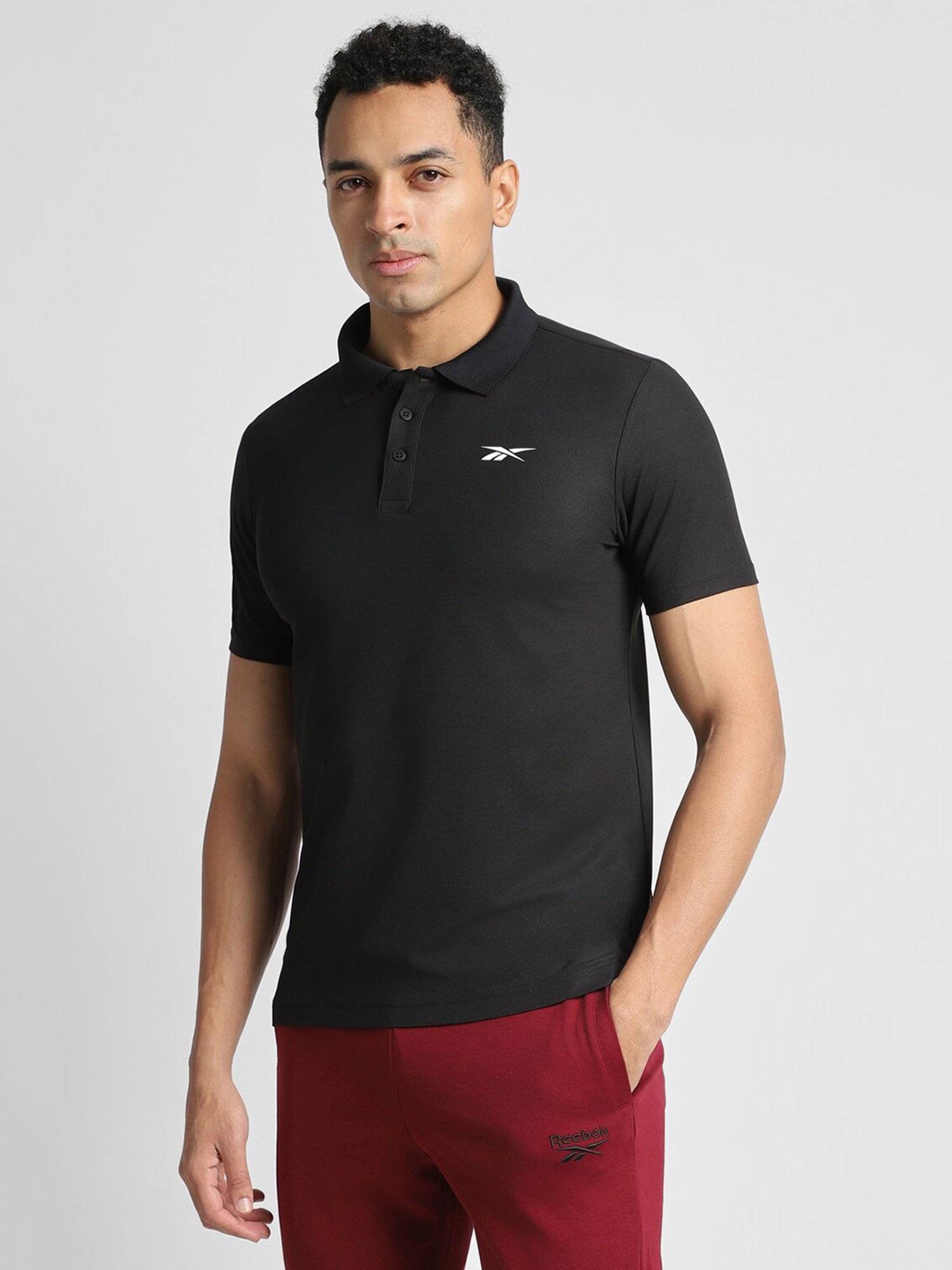 Reebok Black Polyester Slim Fit Solid Polo T-Shirt