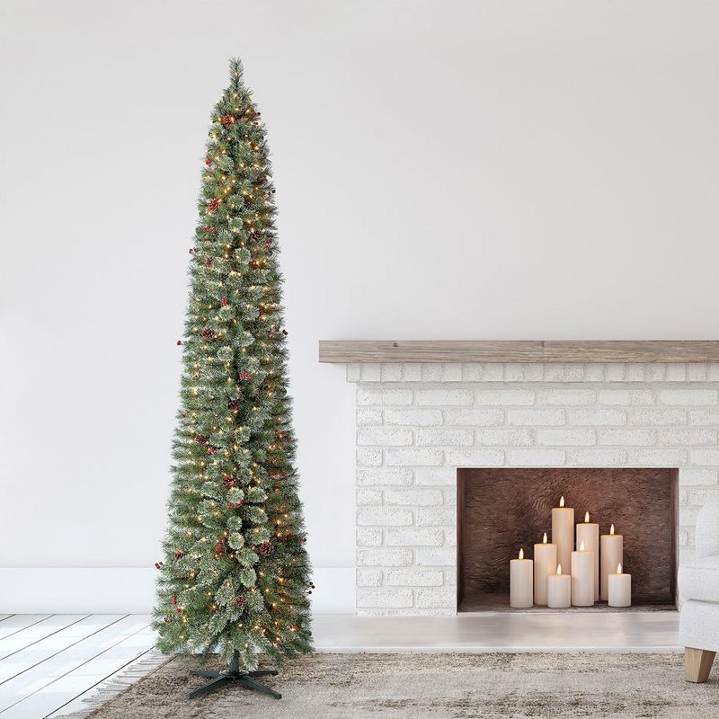 Home Heritage 9 Foot Pre-Lit Skinny Artificial Stanley Pencil Pine Christmas Tree with Clear White Lights, Pine Cones, Red Berries and Foldable Stand