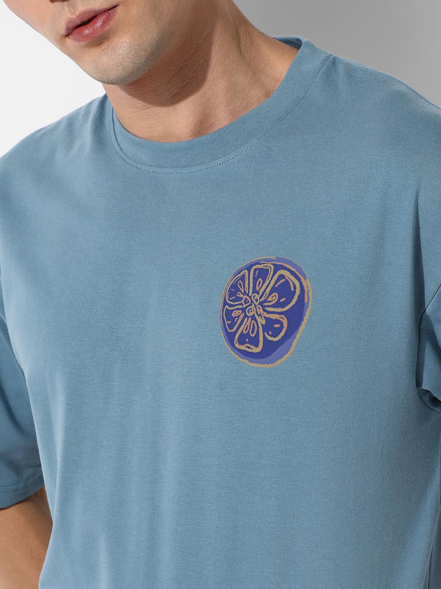 Campus Sutra Sky Blue Regular Fit Oversized Orange Mouth Printed Co-Ord Set