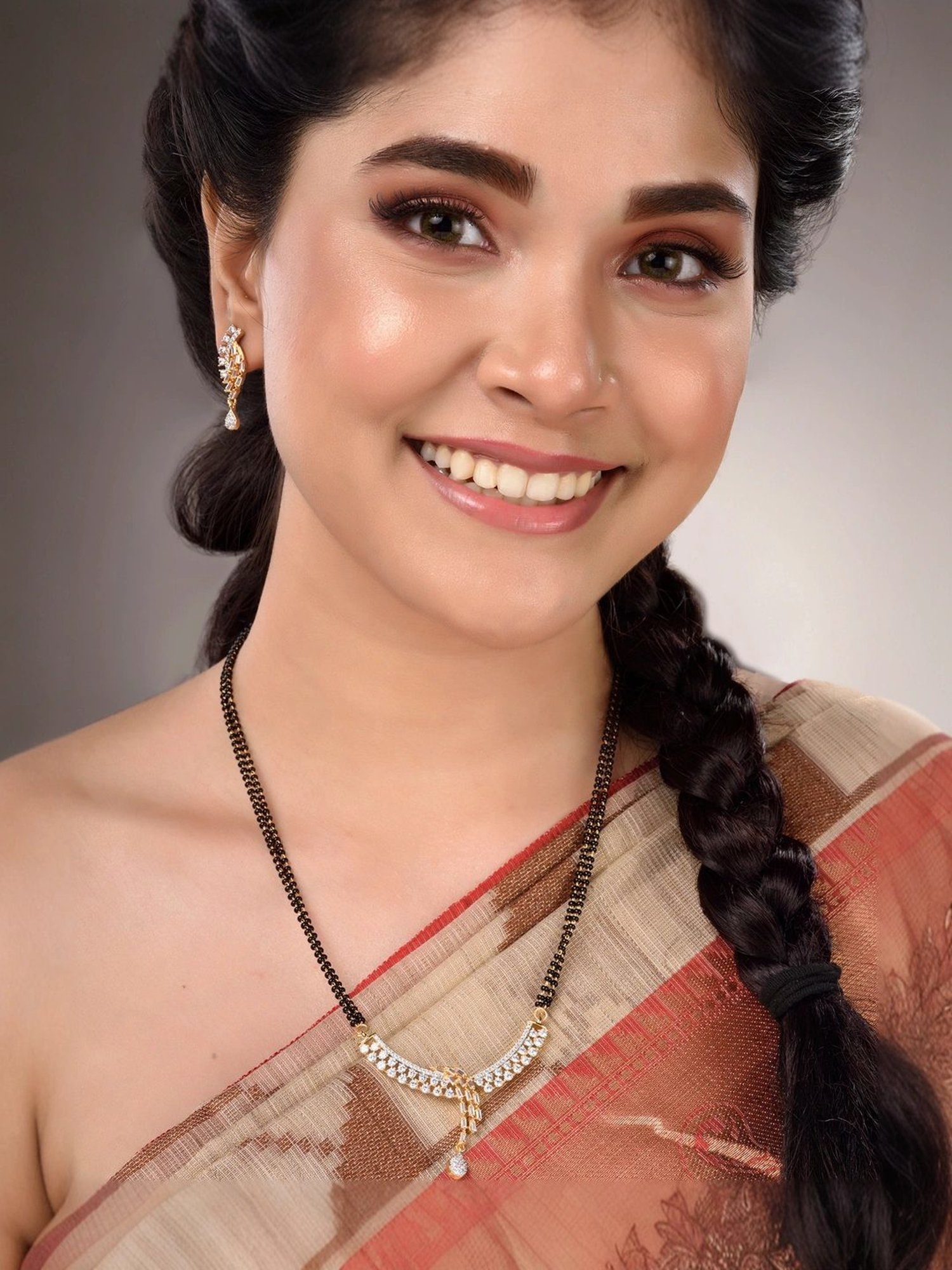 Saraf RS Jewellery Dual Gold Toned AD Studded Modern look Mangalsutra with Earrings