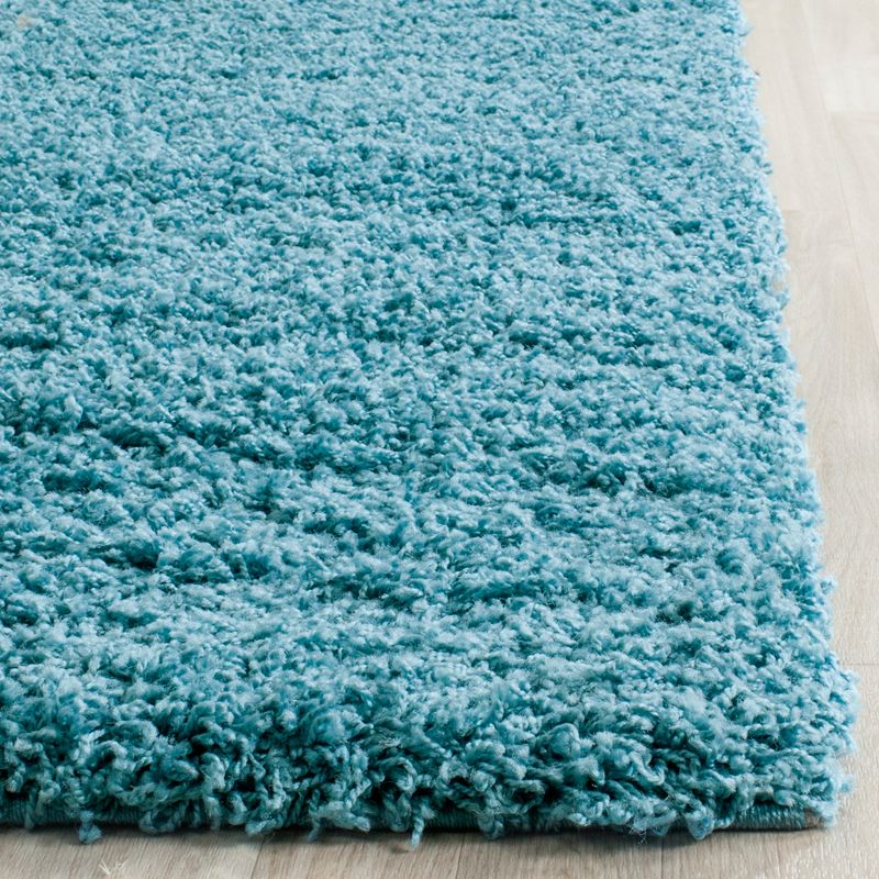 2'3"X4' Rayan Solid Loomed Accent Rug Turquoise - Safavieh