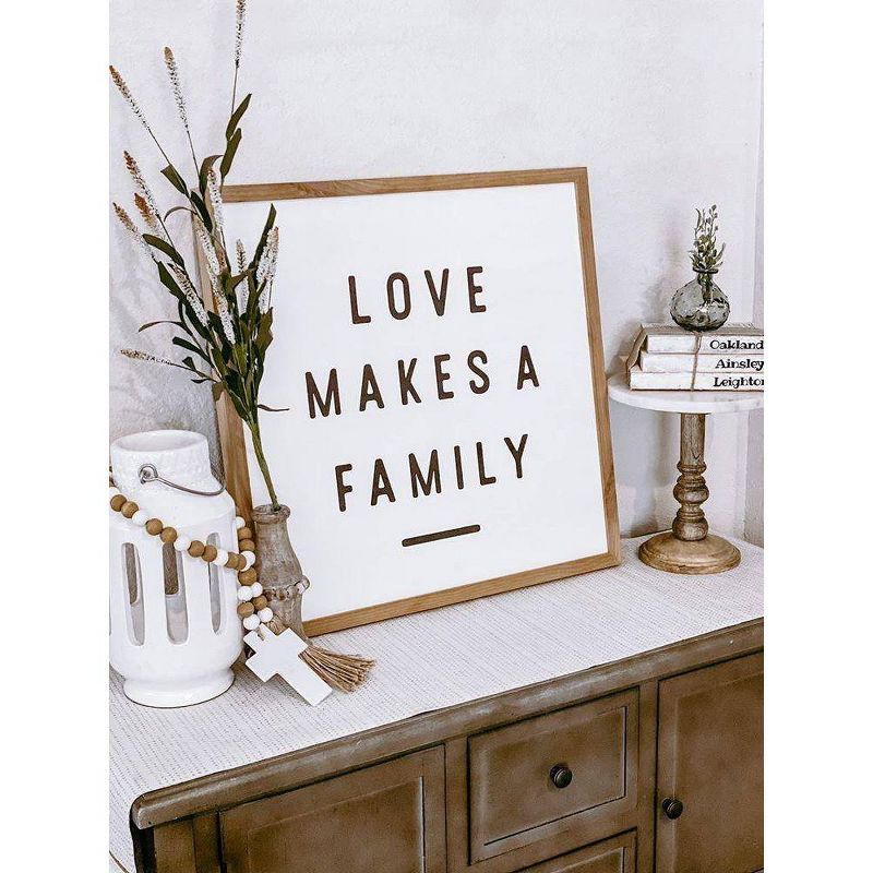 24" x 24" Love Makes A Family Art Board Brown - Petal Lane