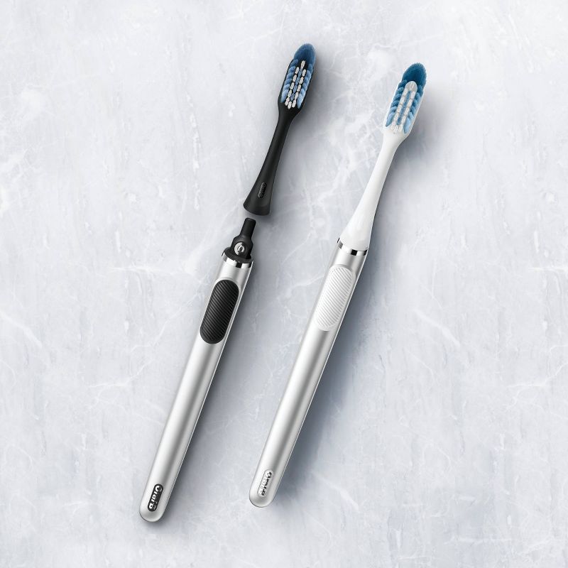 Oral-B Clic Toothbrush - Chrome Black with 2 Replaceable Brush Heads and Magnetic Holder