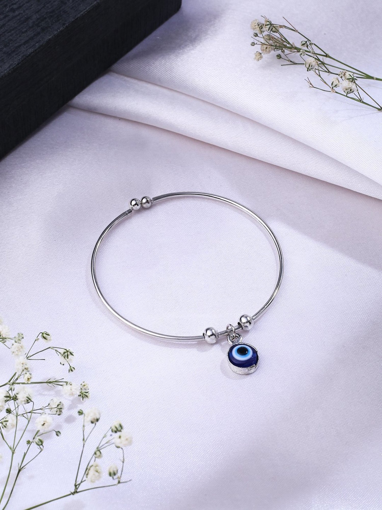 NVR Silver-Plated Evil Eye Rakhi with Roli Chawal