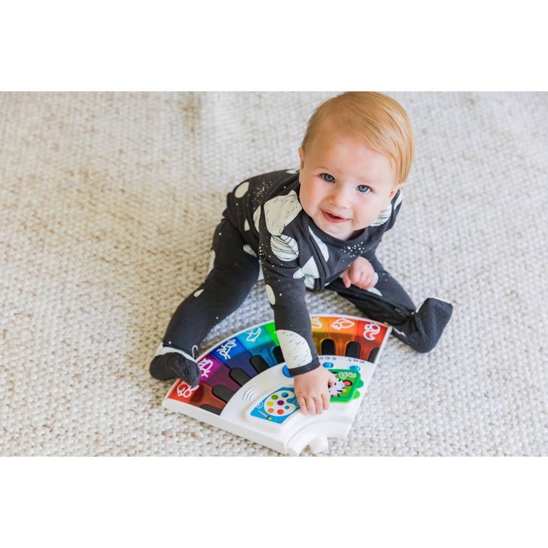 Evenflo Exersaucer Tiny Tropics 2-in-1 Baby Seat + Doorway Jumper