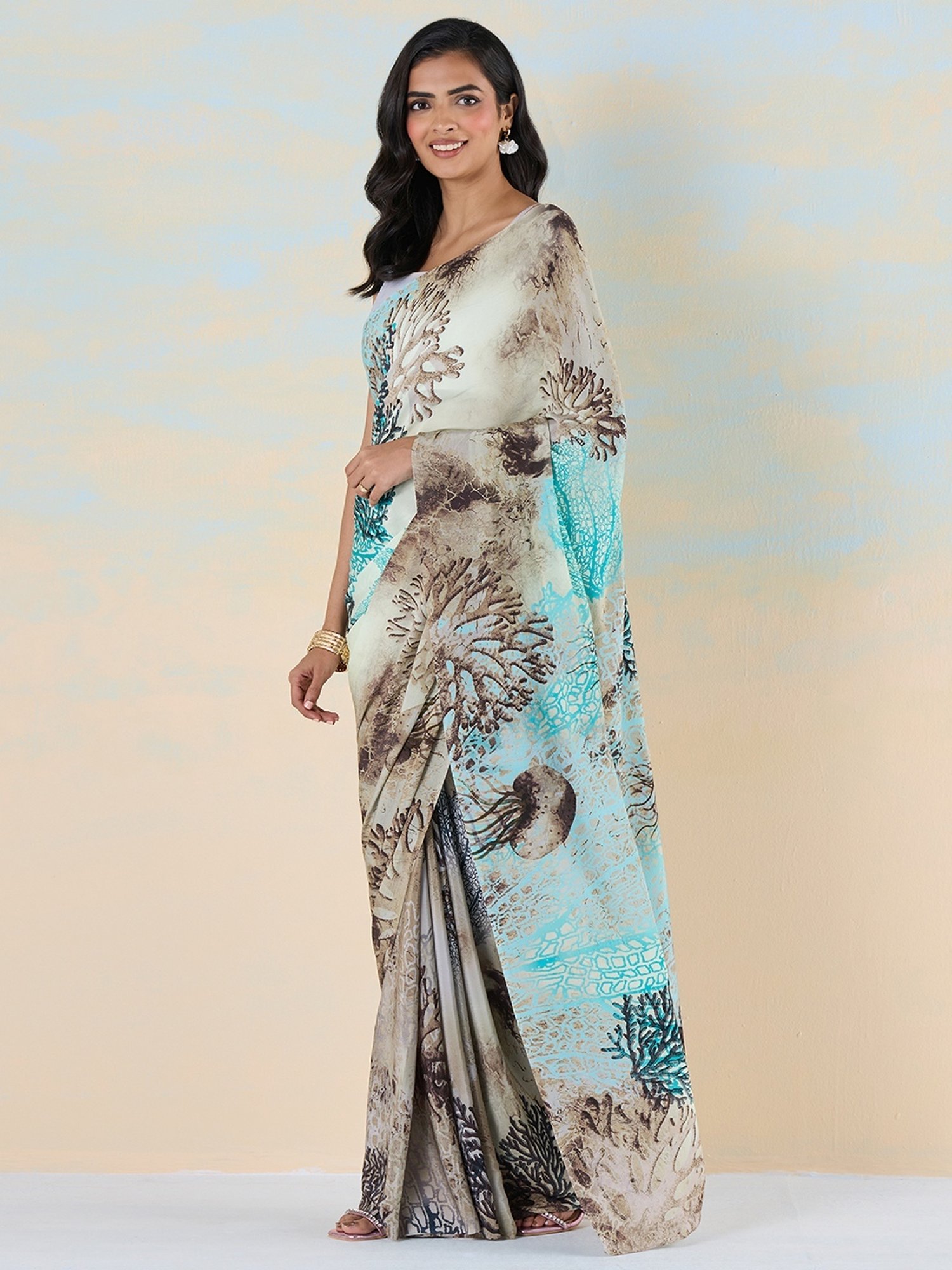 navyasa by liva Blue & Brown Printed Saree With Unstitched Blouse