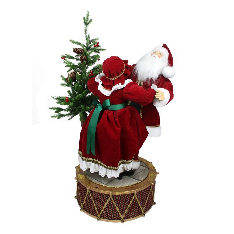 Northlight 32" Musical and LED Lighted Rotating Santa and Mrs Claus Christmas Figurine