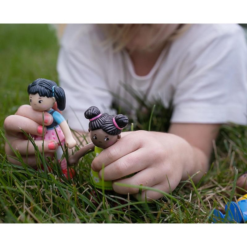 HABA Little Friends Lara - 4" Bendy Doll Figure with Black Pigtails