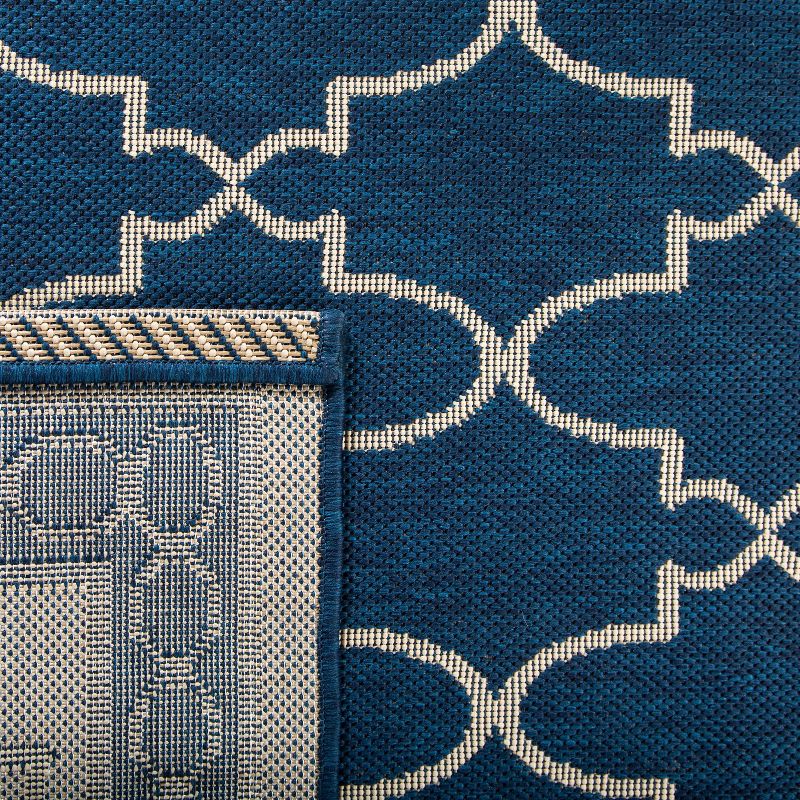 6'7" x 9'6" Gibson Outdoor Rug Navy/Beige - Safavieh