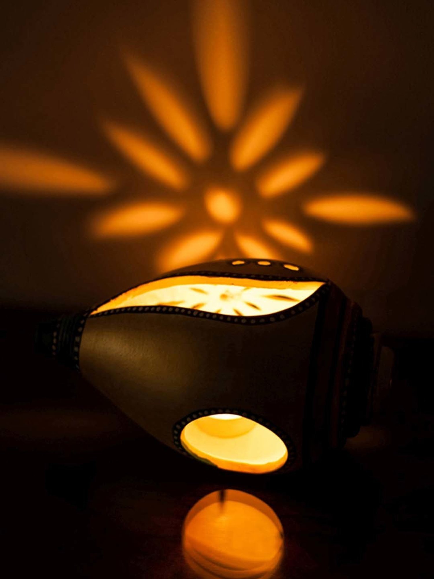 ExclusiveLane Terracotta Handpainted Shankh Shaped Table Tea Light Holder