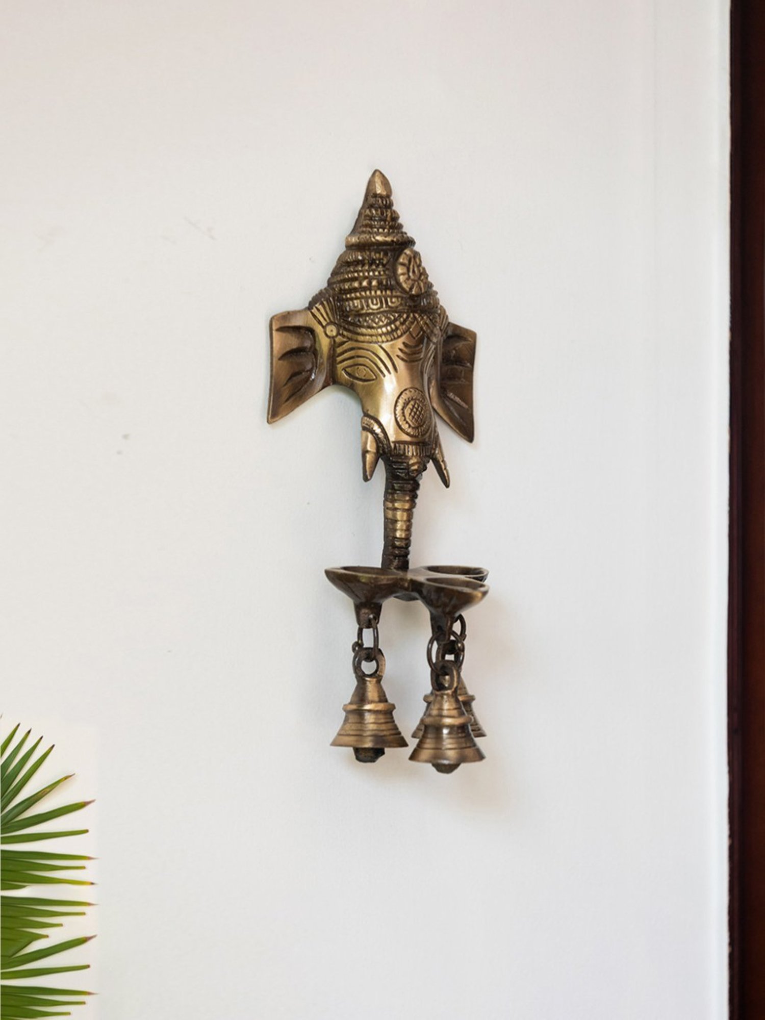 ExclusiveLane Gold Brass Gleeful Ganesha Hand-Etched Decorative Wall Hanging Diyas With Bells