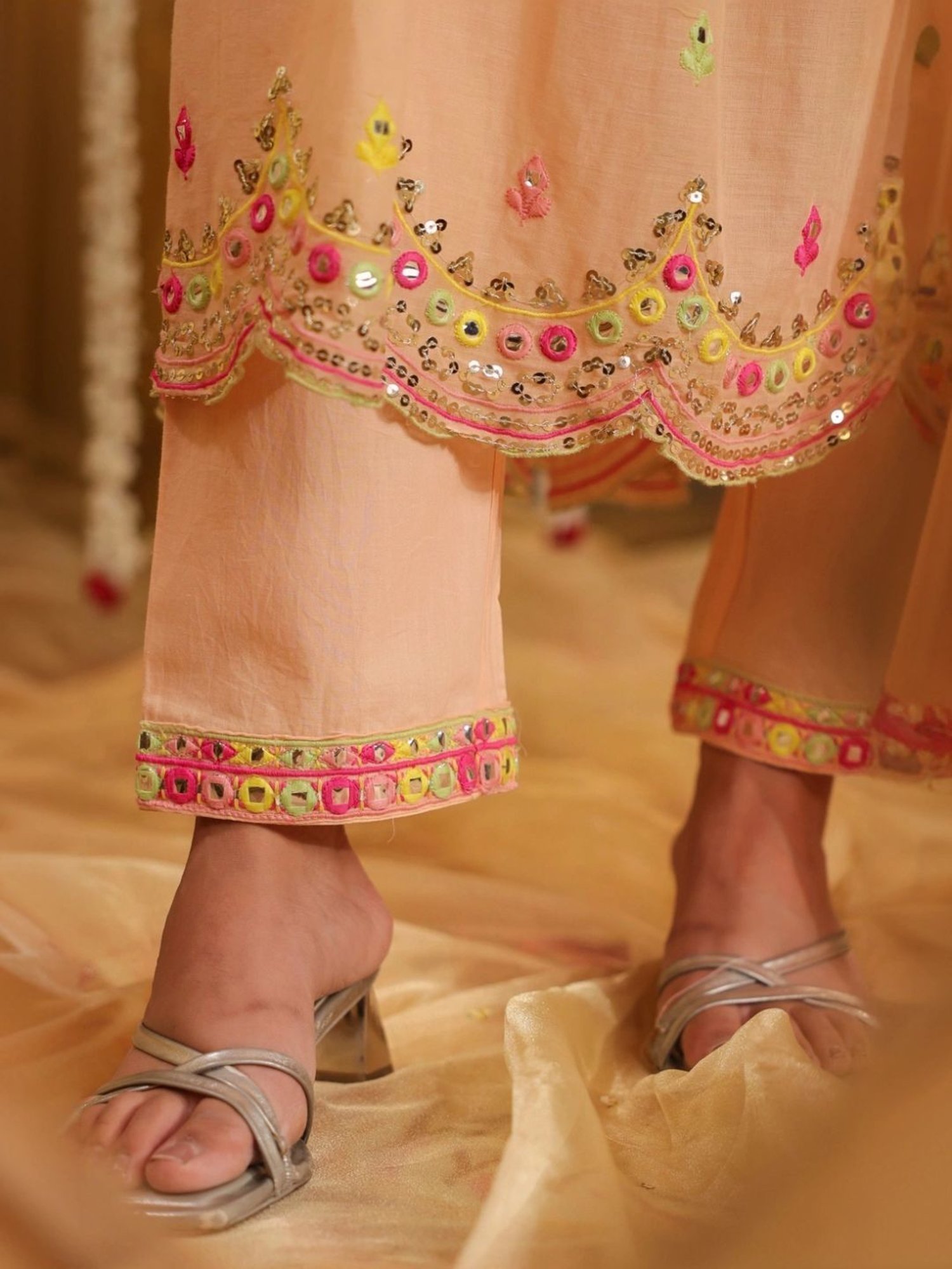 SCAKHI Peach Mulmul Mirror And Sequin Embroidered Sleeveless Gathered Kurta with Pant And Dupatta