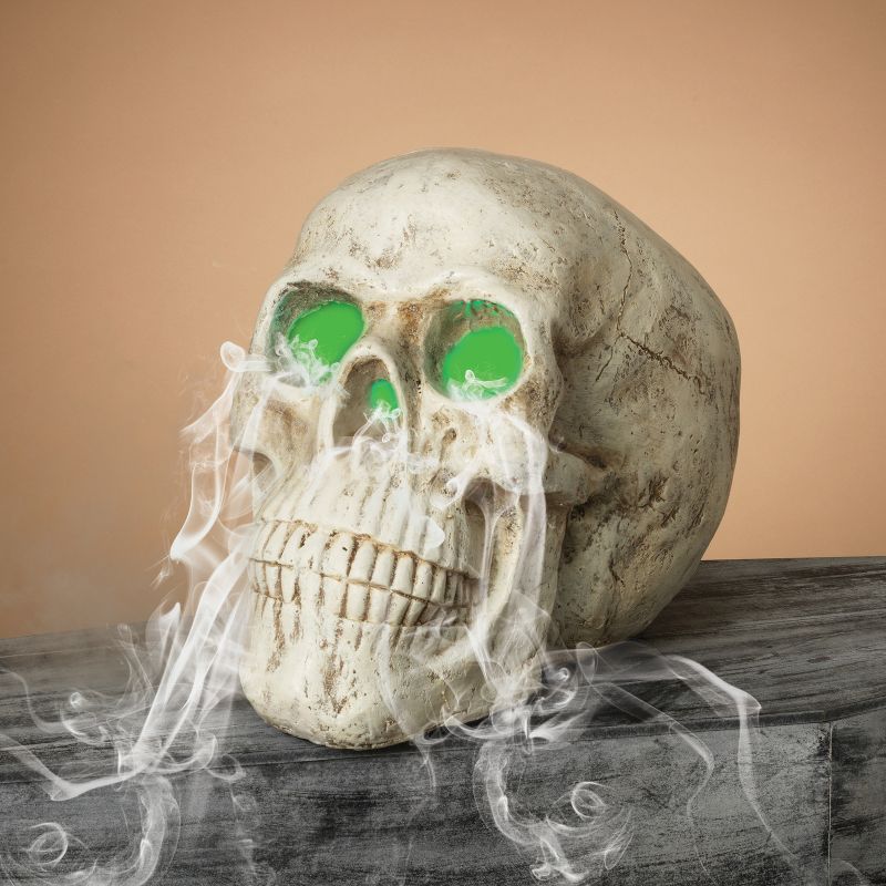 Gerson International 20.8-Inch Long Electric Magnesium Smoking Haunted Skull