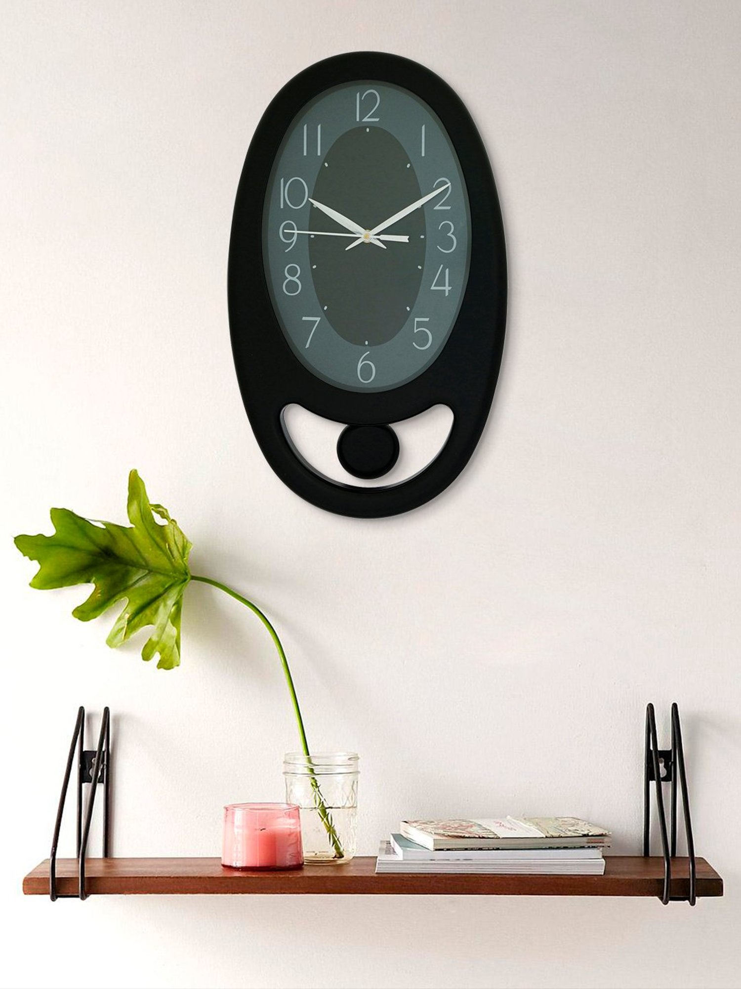 CHRONIKLE Oval Black Plastic Wall Clock