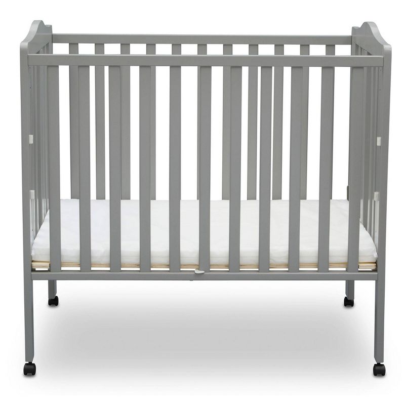 Delta Children Folding Portable Mini Baby Crib with 1.5'' Mattress, Greenguard Gold Certified - Gray