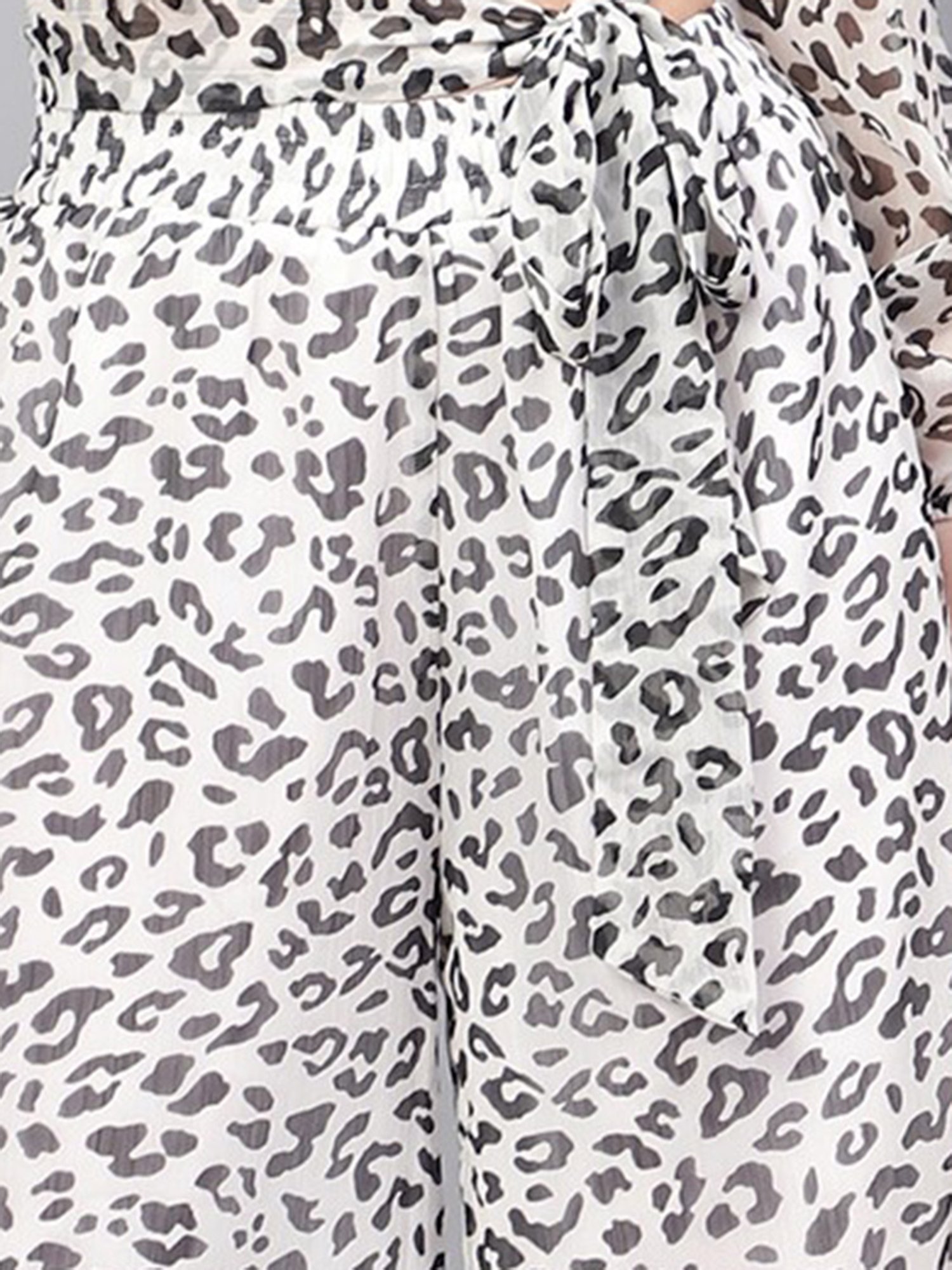 Anvi Be Yourself White & Black Printed Relaxed Fit Mid Rise Palazzos