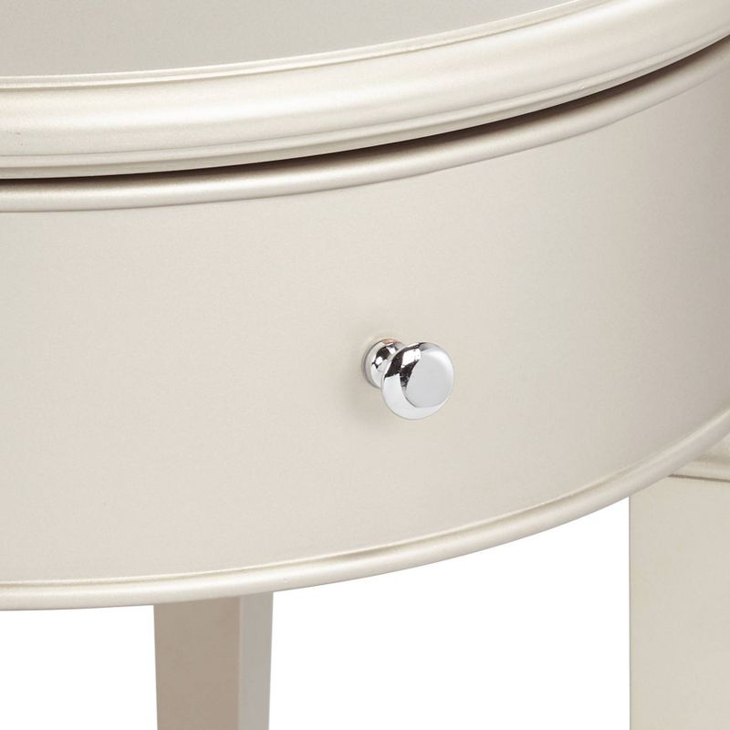 55 Downing Street Alina 1-Drawer Champagne Silver Round Side Table