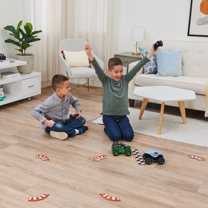 Monster Jam Official Grave Digger vs Megalodon Racing Rivals Remote Control Monster Trucks - 1:24 scale - 2 pk