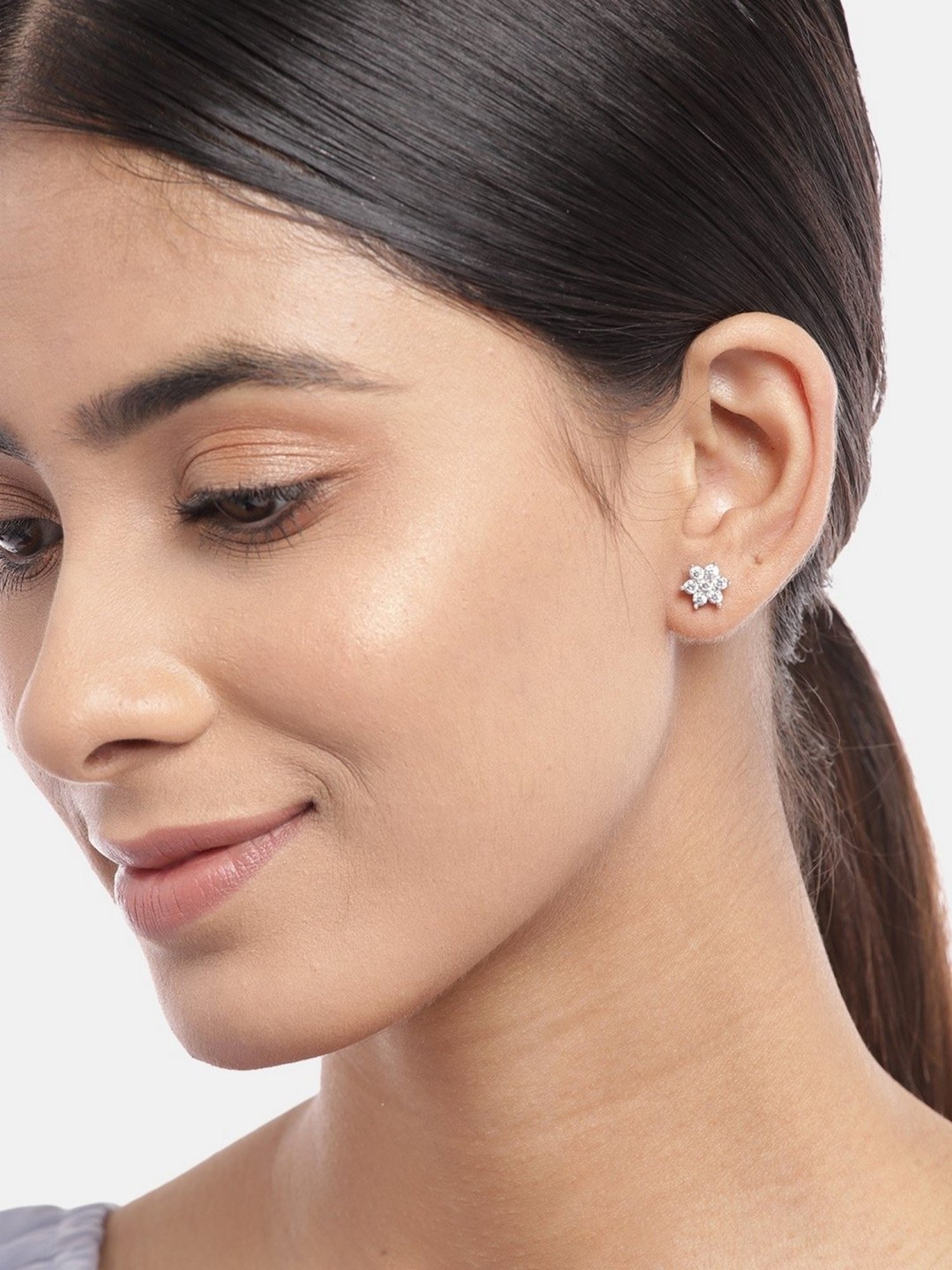 Zavya 92.5 Sterling Silver CZ Studded Star Rhodium-Plated Studs for Women