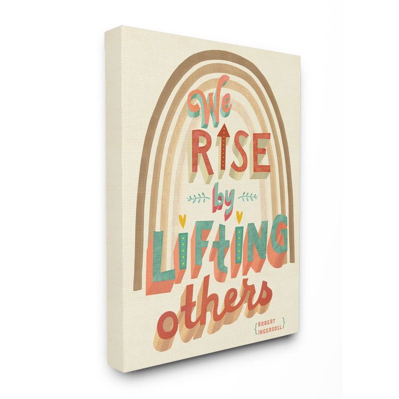 30"x40" Rise By Lifting Others Motivational Phrase Rainbow Stretched Canvas Wall Art by Laura Watson - Stupell Industries