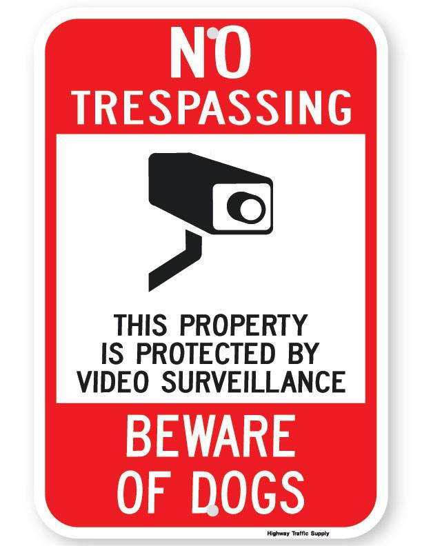 No Trespassing... Beware of Dogs Sign