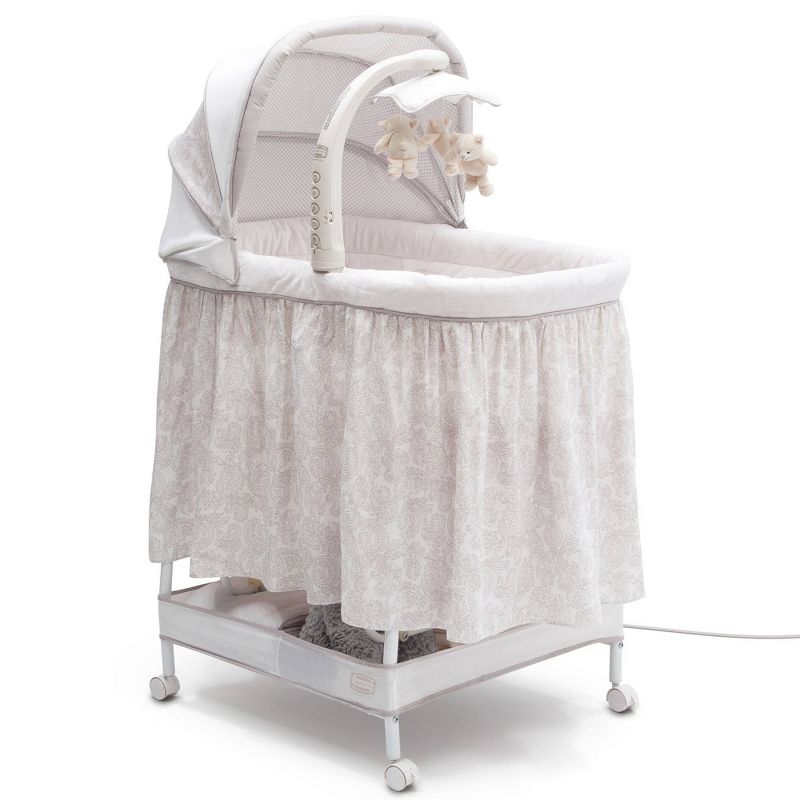 Simmons Kids' Silent Auto Gliding Deluxe Bassinet - Embossed Paisley