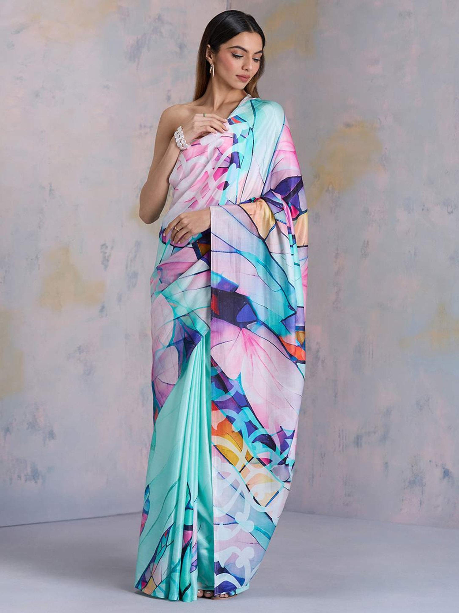 navyasa by liva Blue Printed Saree With Unstitched Blouse