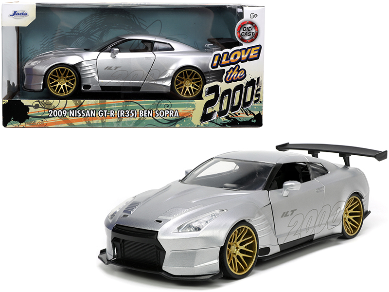 1999 Nissan Skyline GT-R RHD (Right Hand Drive) Blue Metallic with Poker Chip Collector's Token and Game Card "Trivial Pursuit" "Pop Culture" 2022 Release 2 1/64 Diecast Model Car by Johnny Lightning