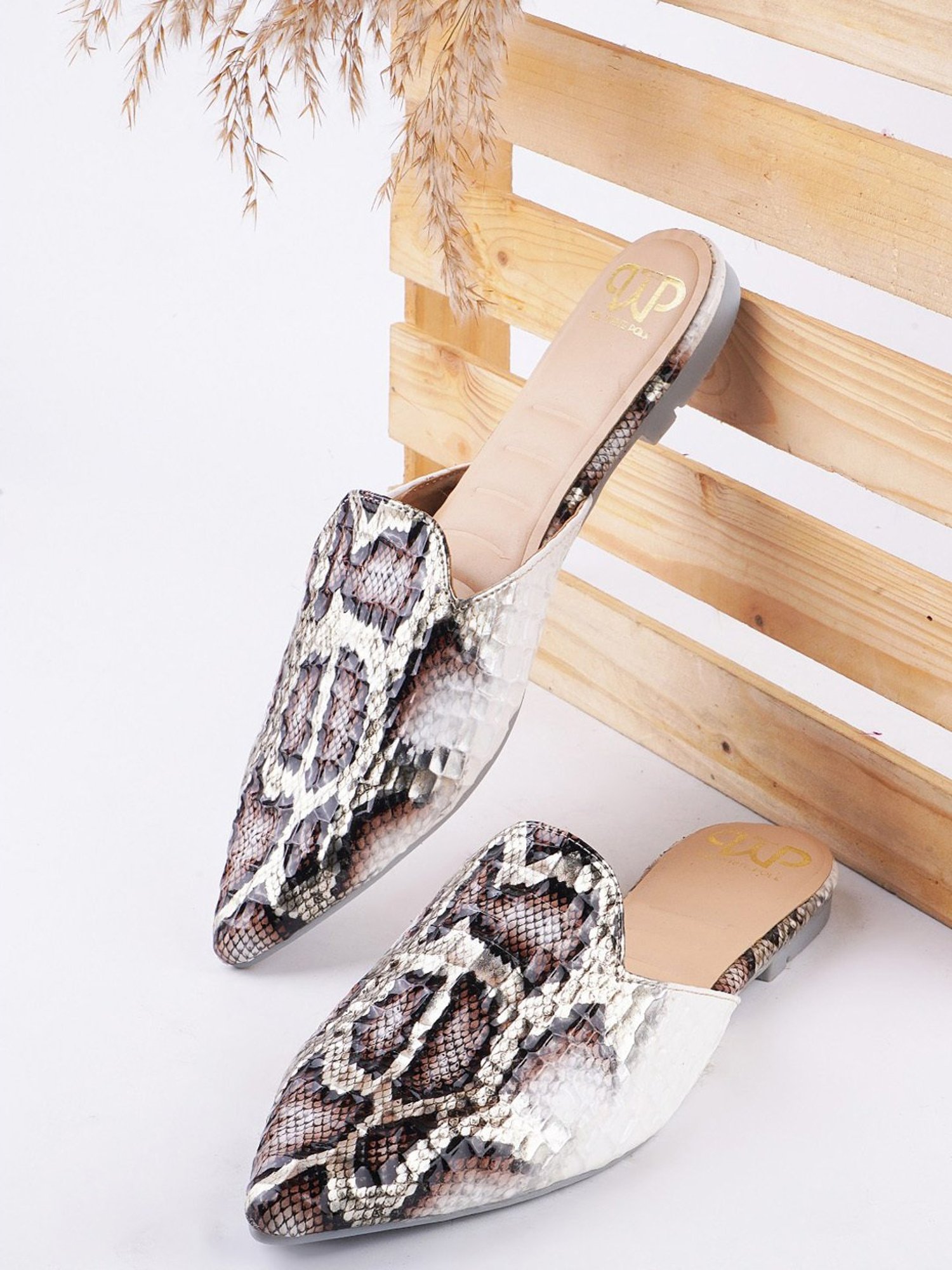 The White Pole Women's White Mule Shoes