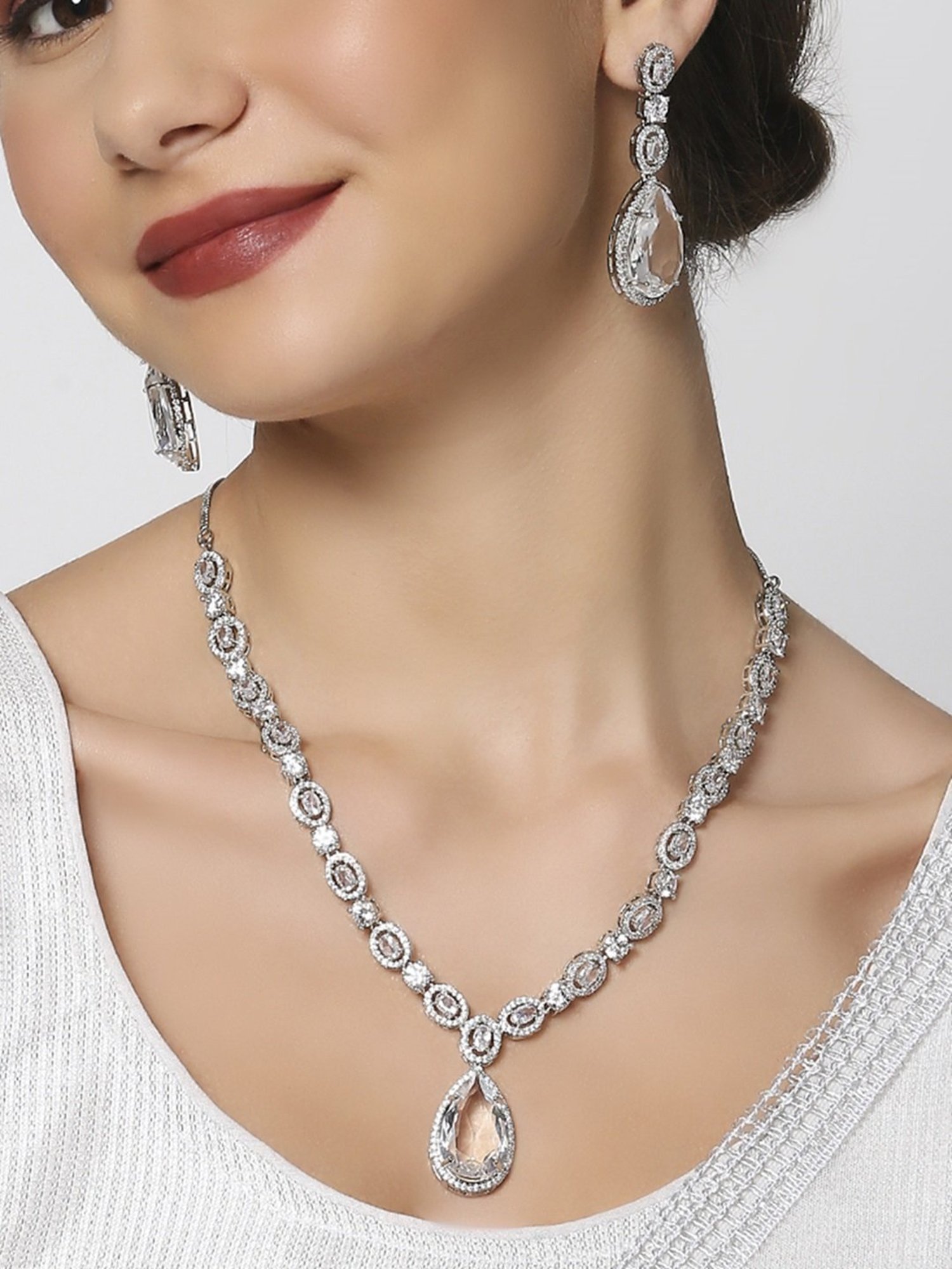 OOMPH Silver Tone American Diamond TearDrop Pendant Necklace Set with Earrings