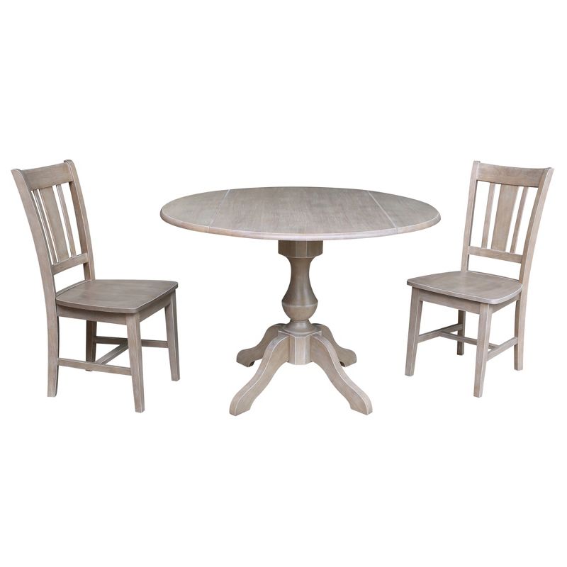 30.3" Camille Round Top Pedestal Extendable Dining Table with 2 Chairs Washed Gray/Taupe - International Concepts