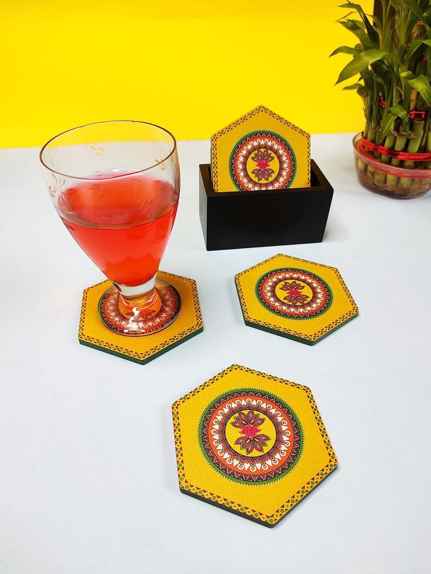 Crayton Yellow Wooden Madhubani Printed Hexagon Coasters with Holder - Set of 6