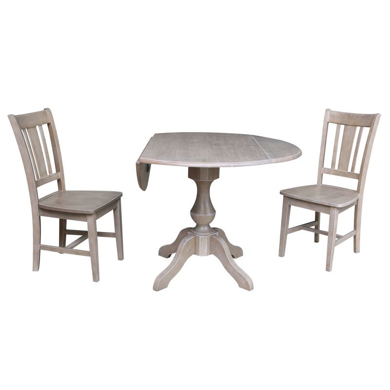 30.3" Camille Round Top Pedestal Extendable Dining Table with 2 Chairs Washed Gray/Taupe - International Concepts