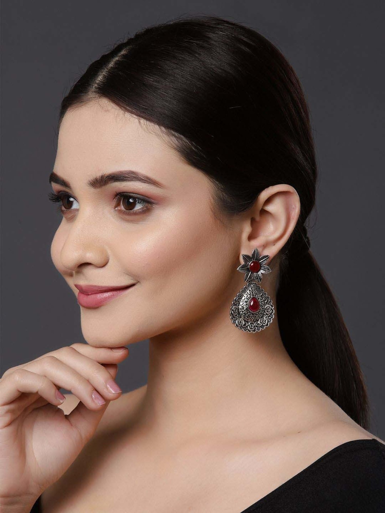 Panash Oxidized Silver-Plated Stone Studded Peacock Shaped Dangler Earrings