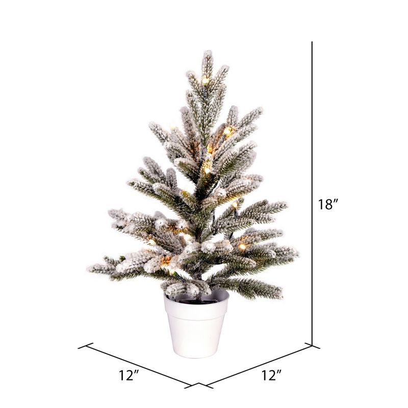 Vickerman 18" x 12" Flocked Mica Pine Artificial Christmas Tree, Battery Operated Warm White LED Lights