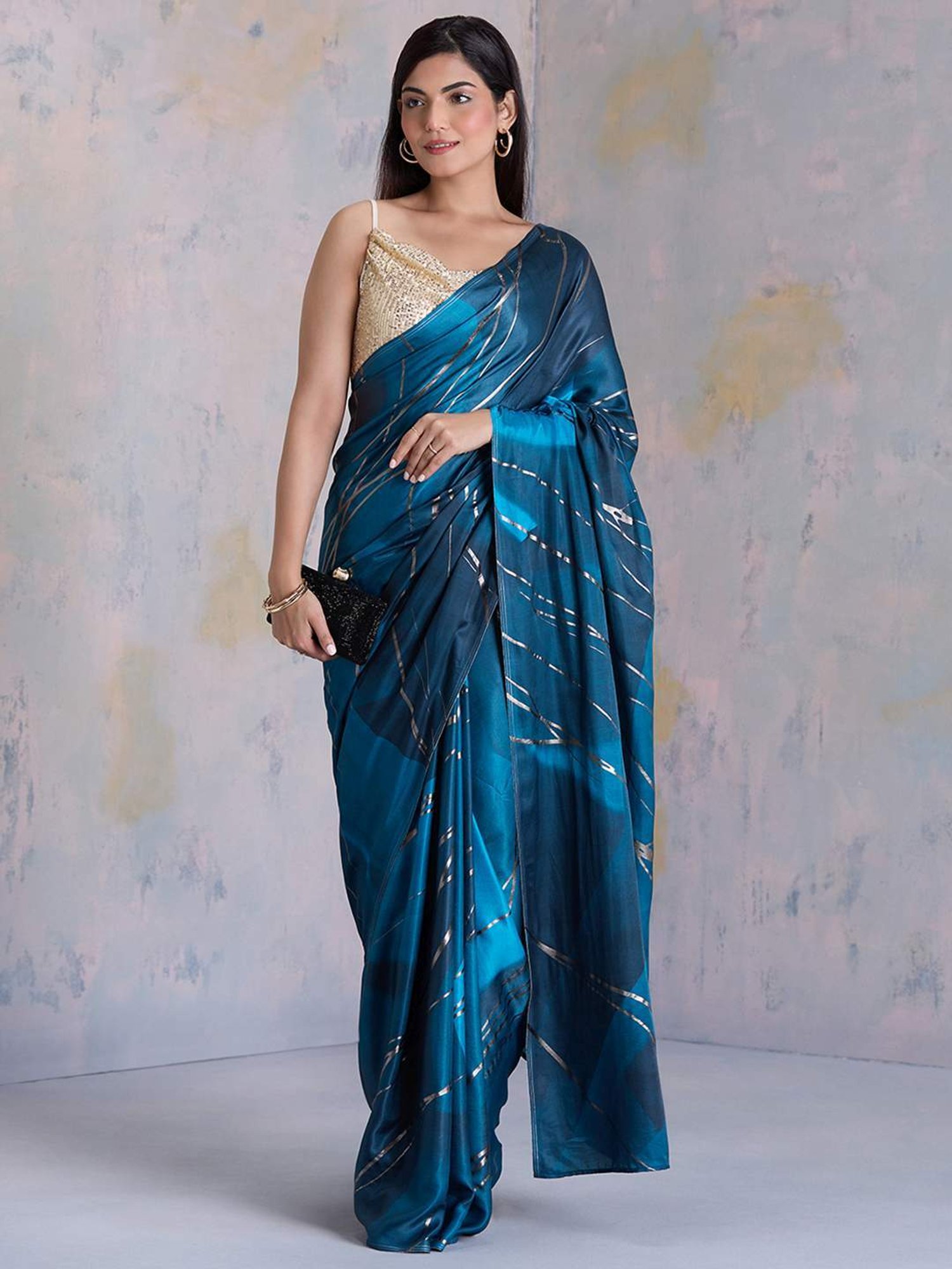 navyasa by liva Blue Printed Saree With Unstitched Blouse
