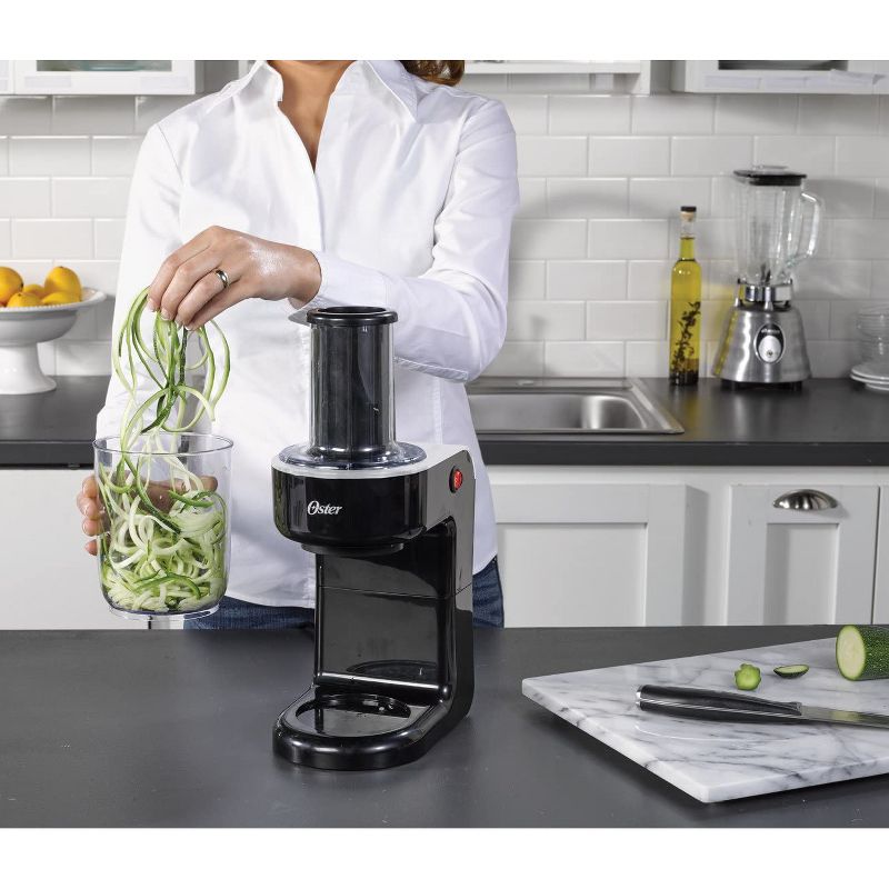 Oster FPSTES1050 Easy to Use Electric Home Spiralizer Food Processor with 2 Blades for Spaghetti and Fettuccine Shaped Noodles