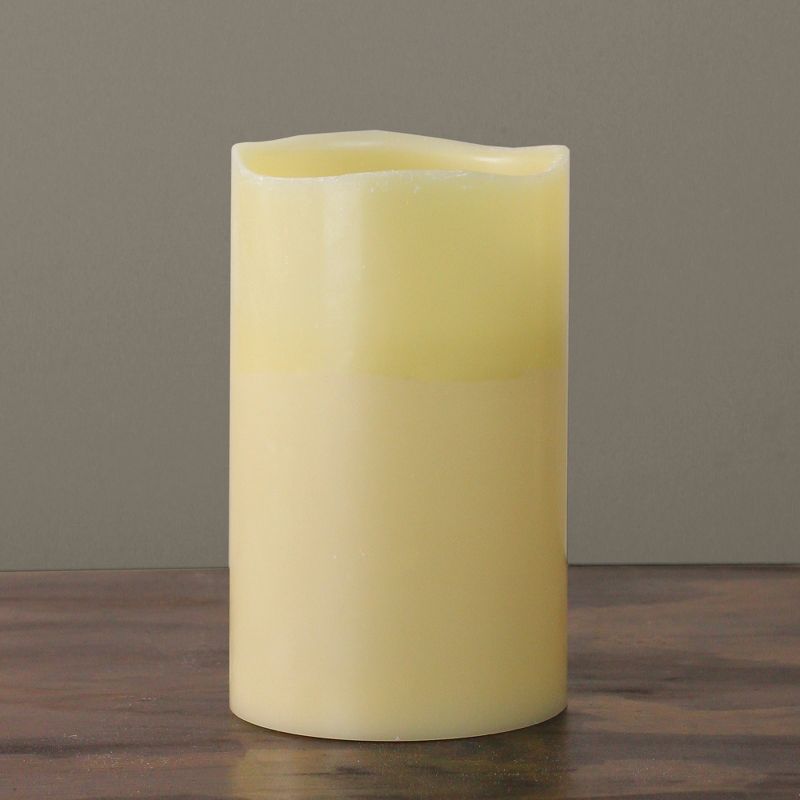 Northlight 10" Prelit LED Battery Operated Flameless 3-Wick Flickering Pillar Candle - Ivory