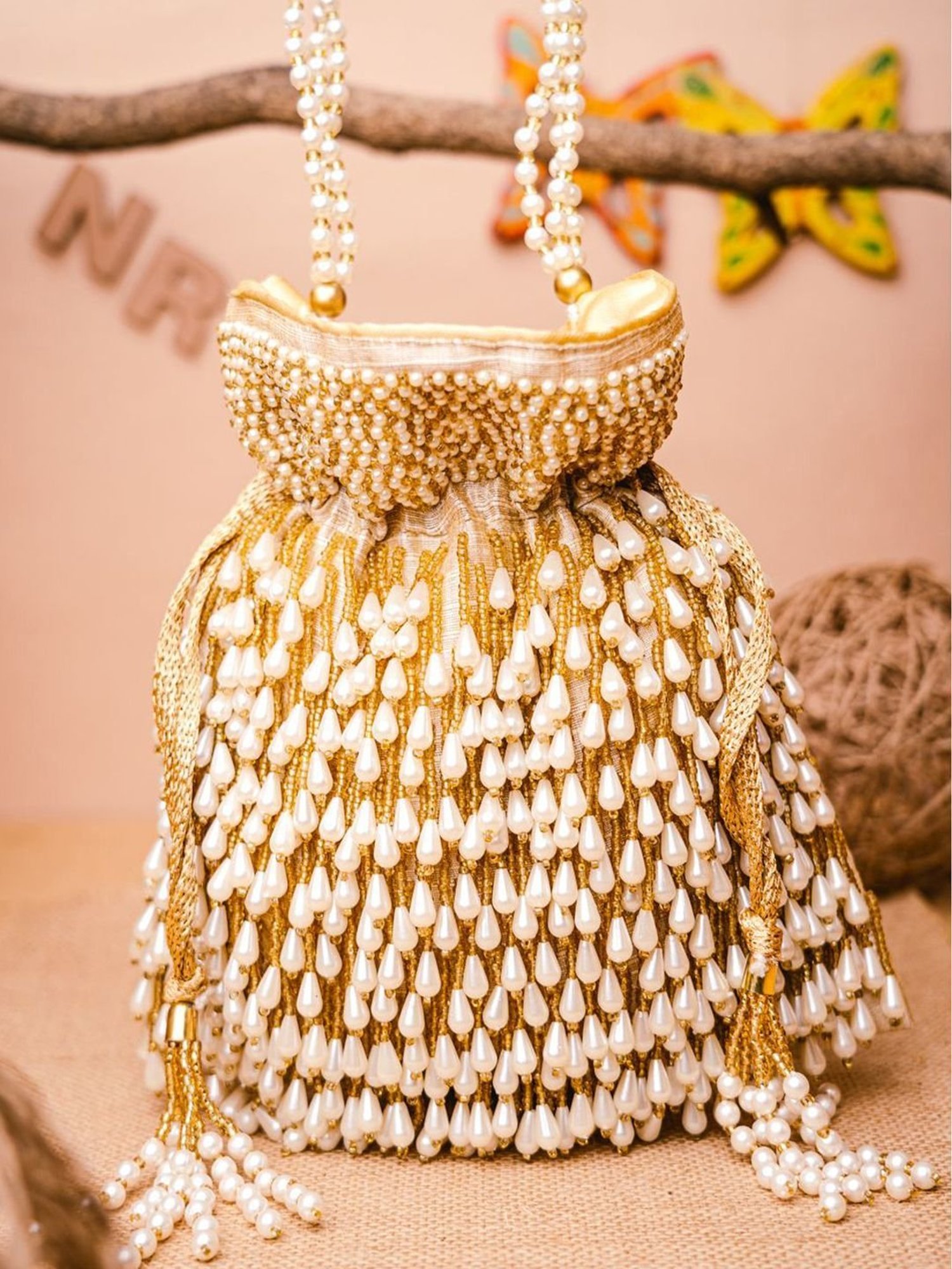 NR by Nidhi Rathi Beige Embellished Potli